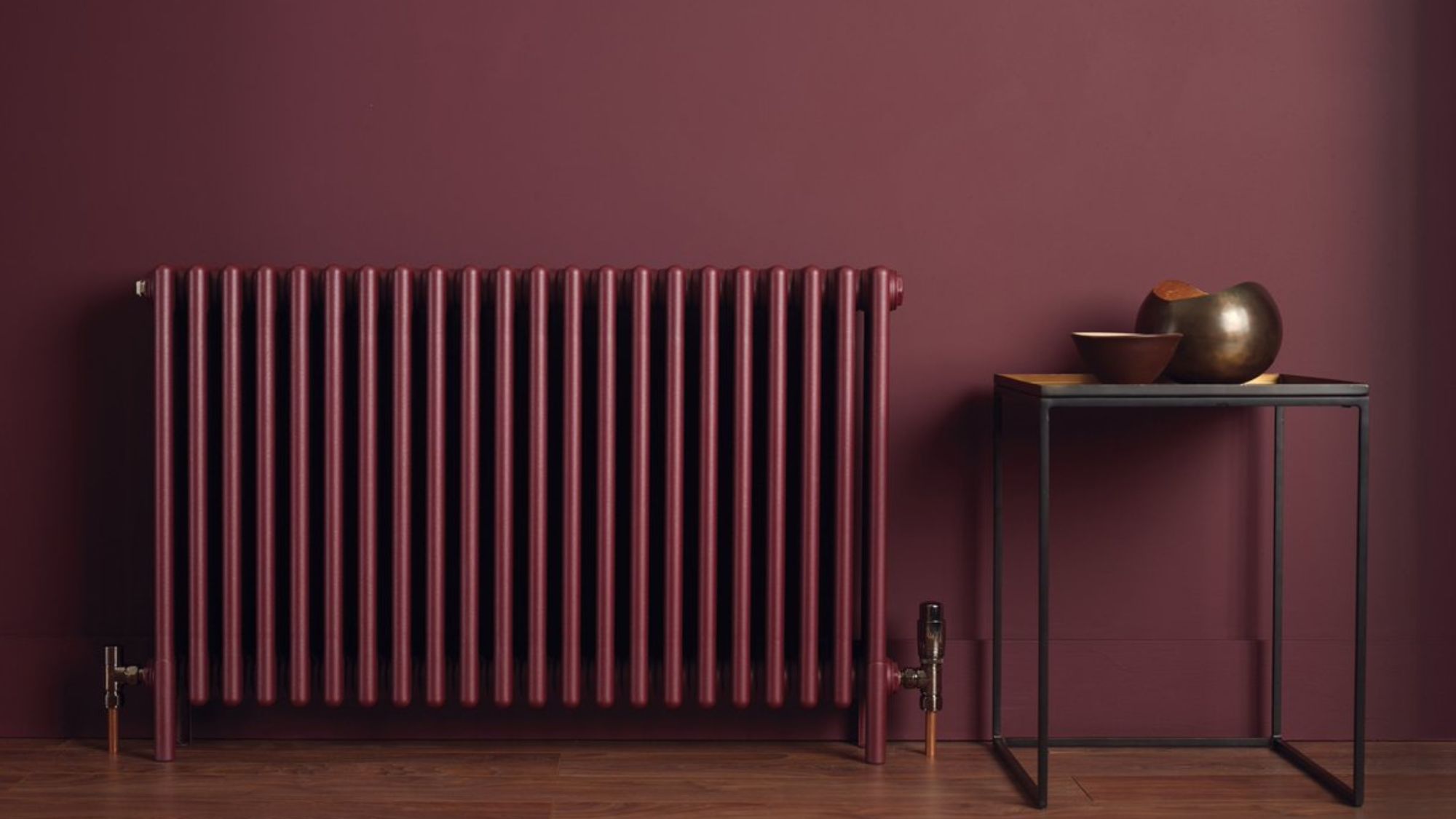 Designer radiators and a maroon background