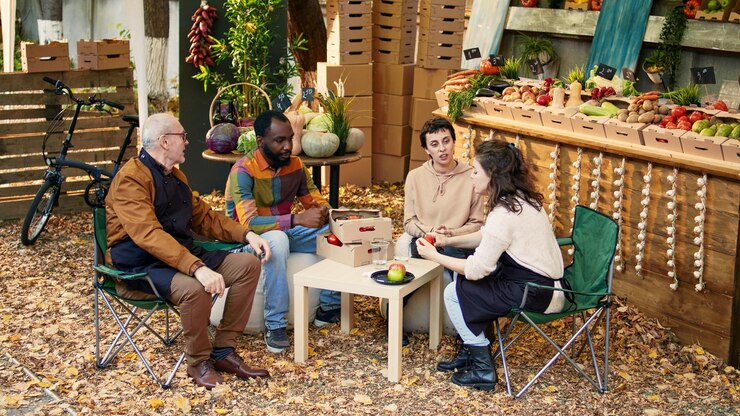 diverse-group-people-sitting-table-tasting-fresh-produce_482257-77611
